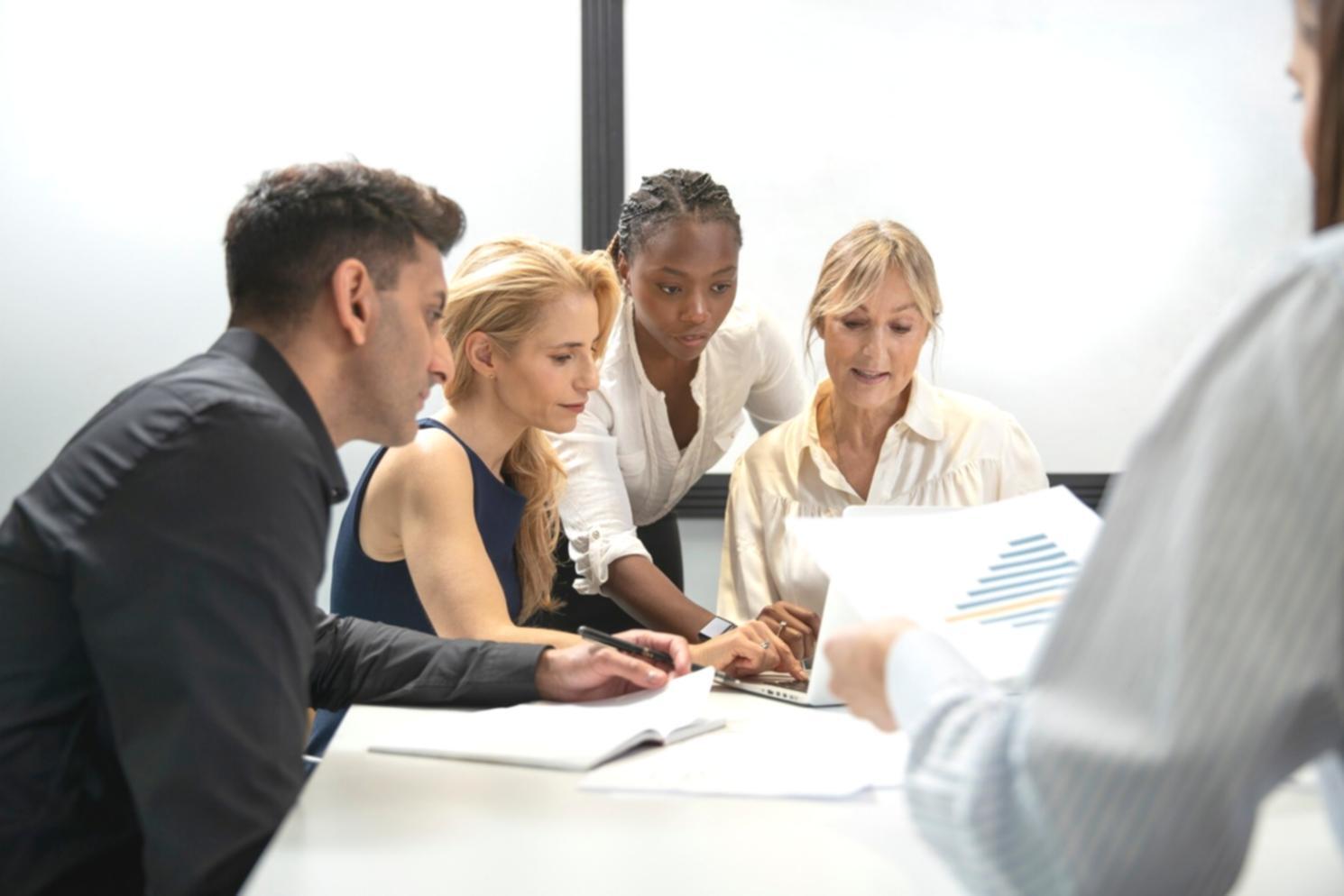 Close-up of financial planning session with notes and charts